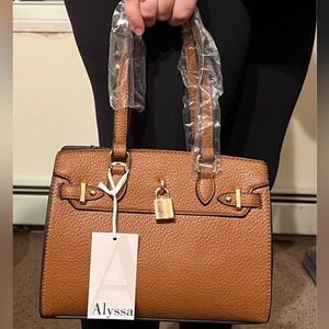 Brown purse brand new with tags.